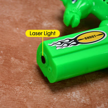 Laser light effect toy gun with musical sounds, close-up