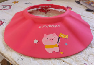 Adjustable bath cap for toddlers, ensuring a tear-free experience